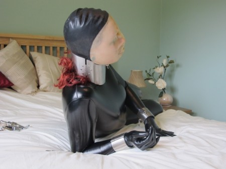 Hogtied In Pvc Catsuit And Rubber Hood