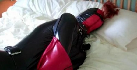 Karina Catsuited Hooded And In A Rubber Armbinder