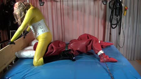 Rubber Face Sitting - Mistress puts her doll in a 2 mm rubber suit with only holes for the nose.The ****** is then completely helpless in the thick rubber and is the mistress involuntarily available.It is a long day for the slave and he does not know when it ends......