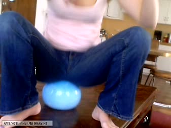 Katie Sits On A Blue Ball In Jeans - I sit on a bouncing blue ball and sit and wiggle around on it