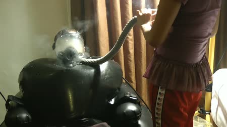Gas Mask Smoking On The Inflatable Chair