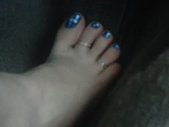 Btr1 - Heres rubie driving around barefoot as usual again. This time she is wearing her toe rings with her blue nail polish.