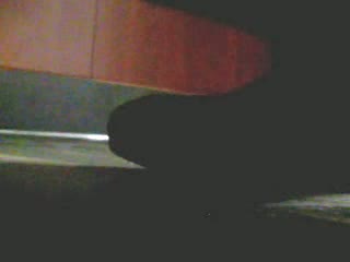 Officegirl Black Boots Ao11 - This is small clip from along video, cause the most part is useless. Her feet was very close to the hidden cam. No heels