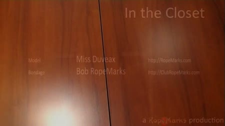 In The Closet - We invited miss duveaux for a nice dinner out, all pretty and dressed up she arrived at our place. As she is always in for some good fun we asked if she liked some quick and dirty bondage before dinner; she did...

a quick upper body bondage, legs together and before she realized what happened we lifted her in in our closet and bound her tightly by the neck against the clothing-hanger. A cleave-gag finished the job, before we went out to dinner, without miss duveaux...