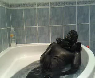 Total Enclosure Latex In Bath With Bin Bag  - This is an old clip of me going in the bath. Locked in my latex total enclosure suit with a bin bag over my head, rubbing myself all over it feels so amazing.