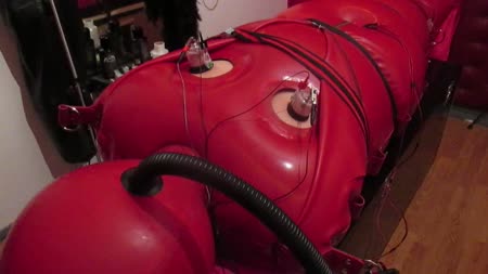 Extreme Rubber Bondage - Estim In Inflatable Sleepsack